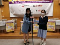 Megan Chen of 3D Receiving the Best Debater Award